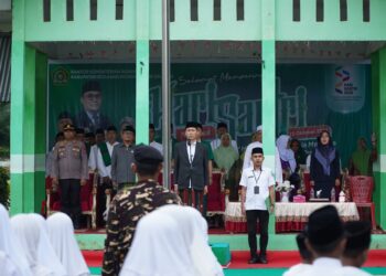 Bupati Iskandar Apresiasi Dedikasi Santri dalam Peringatan Hari Santri Nasional di MIN 1 Bolsel
